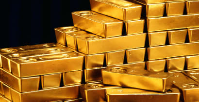 Gold Ends Up at $1,392 Per Ounce