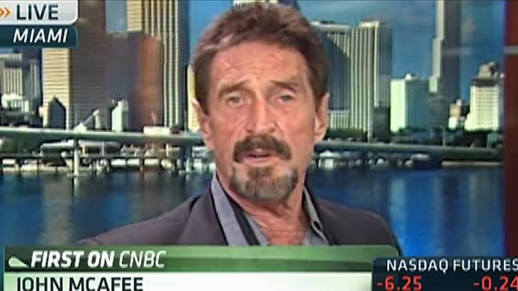 John McAfee: 'I Will Not Be Charged With This'