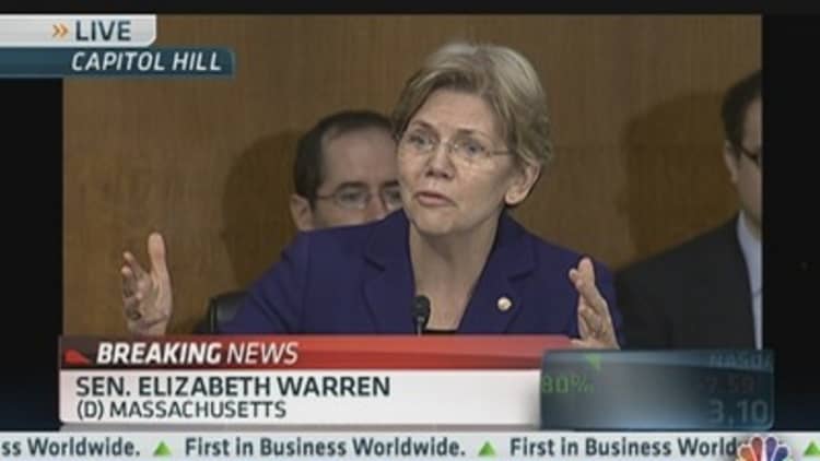 Warren: Big Banks Getting Free Insurance Policy?