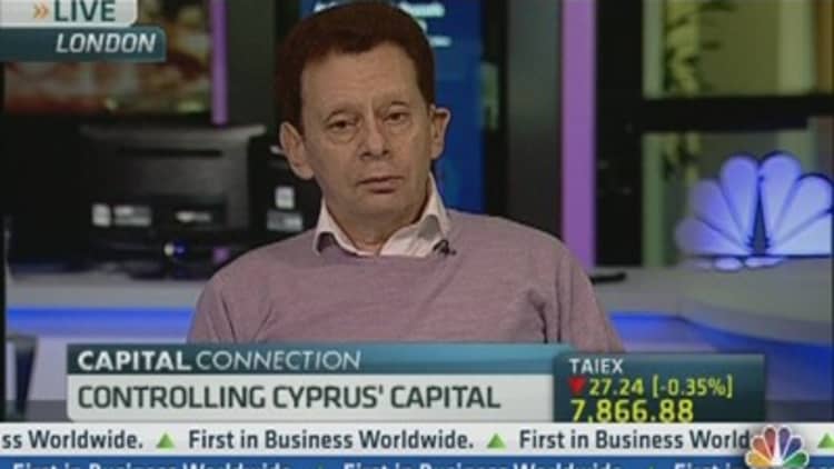 Cyprus 'End Game of Greek Bond Bubble'