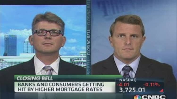 Banks hit breaks on mortgage business