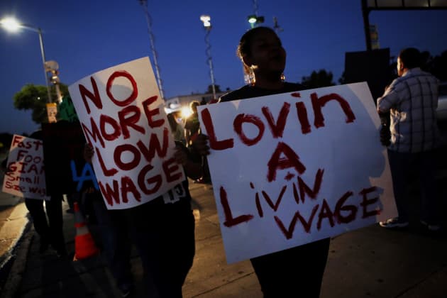 Premium: California minimum wage workers protests employment 
