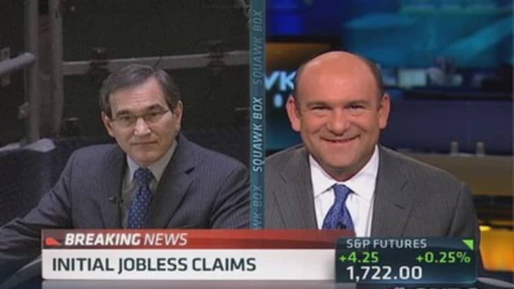 Initial jobless claims up 15,000 to 309,000