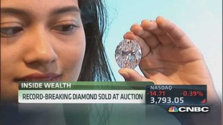 Sotheby's eye-popping 118-carat diamond sets record price 