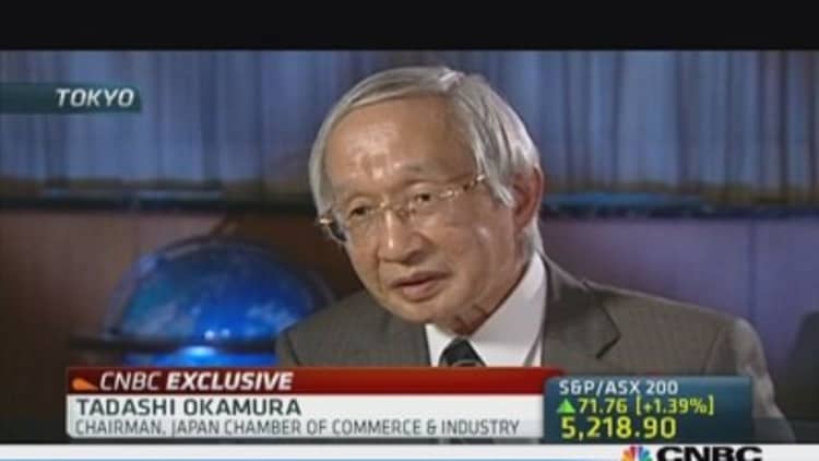 Japan official: Economy needs corporate tax cuts