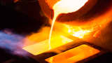 Molten gold pours from a crucible into a heated mold after refining at the Kaloti Jewellery factory in Sharjah, United Arab Emirates.