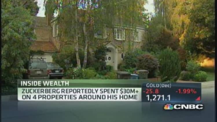 Zuckerberg buys 4 neighbor's homes