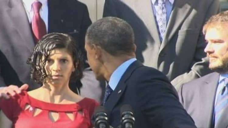 Woman nearly faints at Obamacare press conference