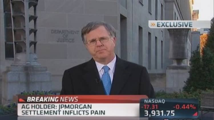 AG Holder: JPM settlement inflicts pain