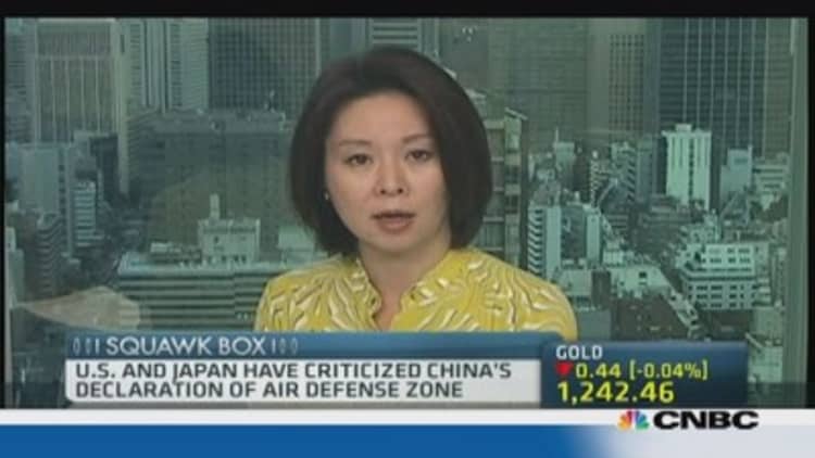 US aircraft defies China by flying into defense zone