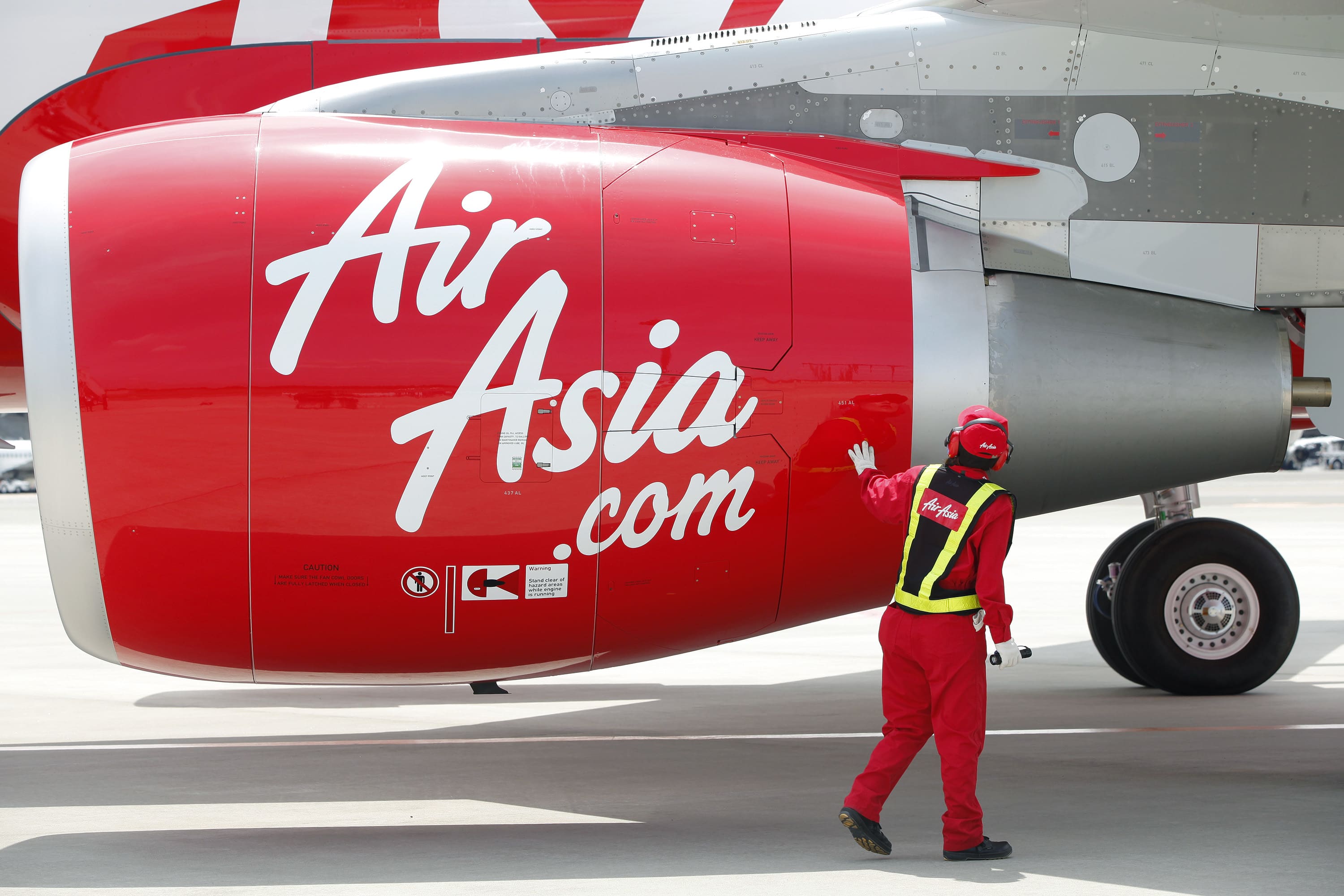 AirAsia seeks early merger with AI Express | Mint