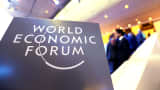 A logo sits on a sign at the World Economic Forum in Davos, Switzerland, on Thursday, Jan. 23, 2014.