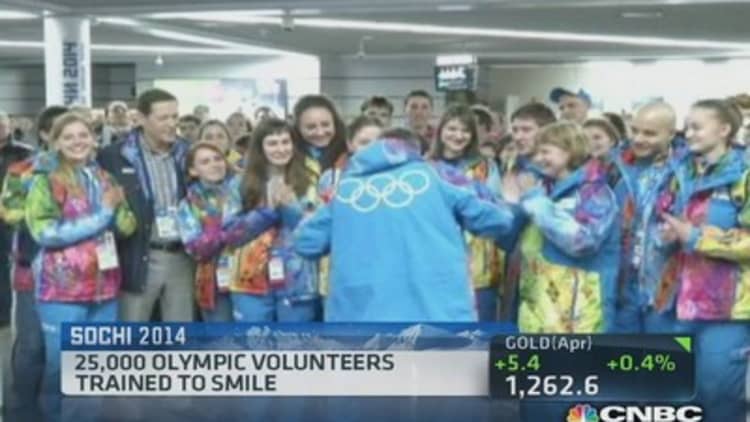 Olympic volunteers trained to smile