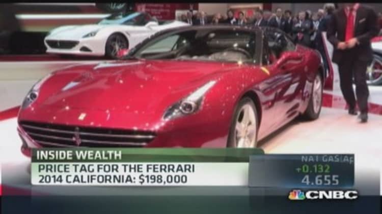 Ferrari profits from selling less