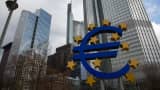 The stars of European Union (EU) membership sit on a euro sign sculpture outside the headquarters of the European Central Bank (ECB) in Frankfurt, Germany.