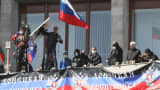 Pro-Russian activists seize the main administration building in Donetsk, Ukraine.