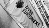 The Euronext flag hangs outside the NYSE.