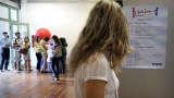 Young graduates visit a job fair at the Athens Technopolis