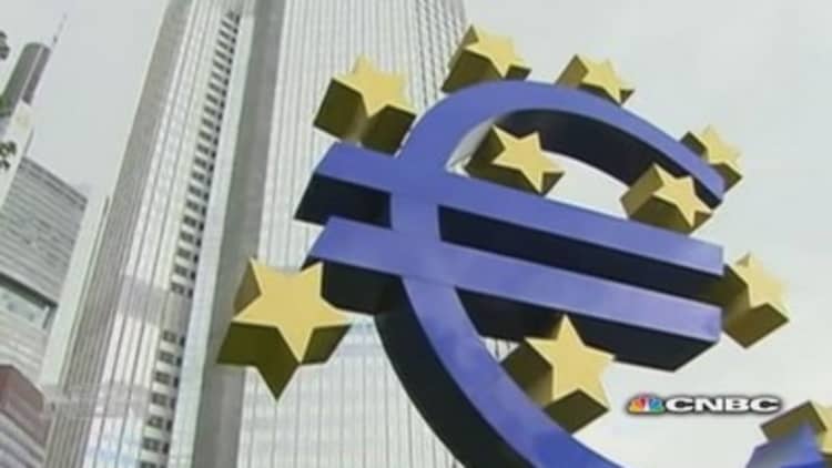 ECB cuts rates 