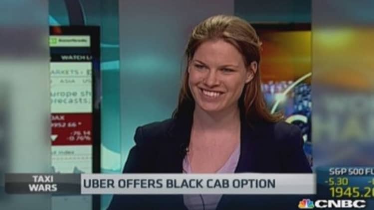 Uber to work with black cabs