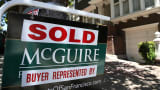 A sold sign is posted in front of a home for sale on May 27, 2014 in San Francisco, Calif.