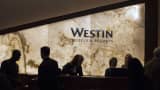 Employees assist guests at the Starwood Hotels & Resorts Worldwide Westin New York Grand Central in New York.