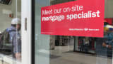 A sign offering mortgage help at a Bank of America branch, New York City.