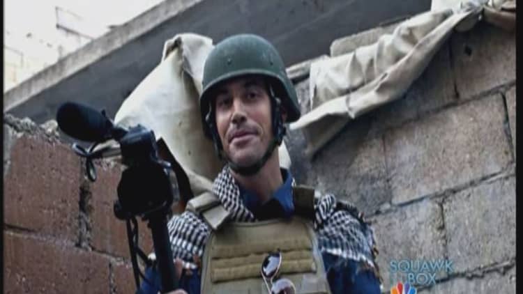 IS claims beheading of journalist James Foley