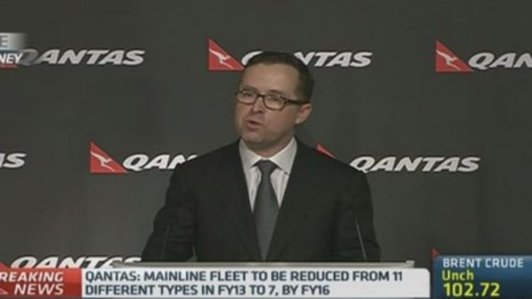 Qantas posts record full-year net loss