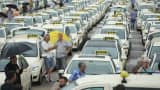 Taxi drivers gather next to the Olympia Stadium to protest ride-sharing apps on June 11, 2014 in Berlin, Germany.