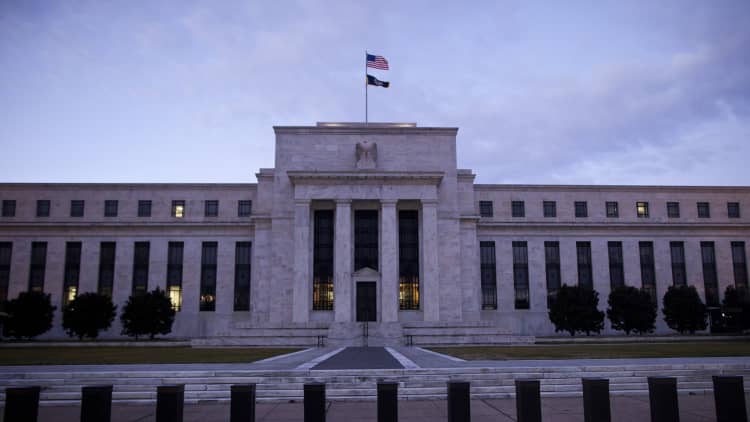 Fed keeps heat on banks