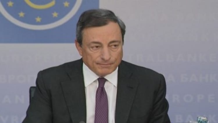 ECB cuts rates, starts ABS program