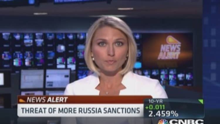 EU threatens more Russia sanctions 