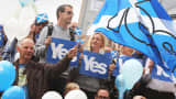 Pro-Scottish independence 'Yes Scotland' campaign supporters await the start of a press event on September 8, 2014 in Glasgow, Scotland.