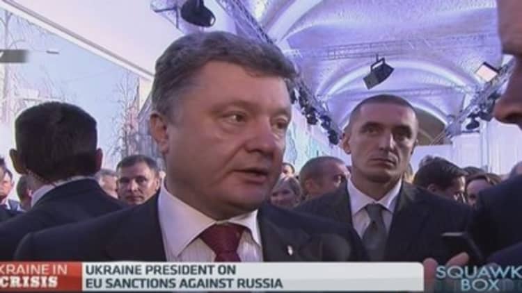We'll lift sanctions if Russia complies: Poroshenko
