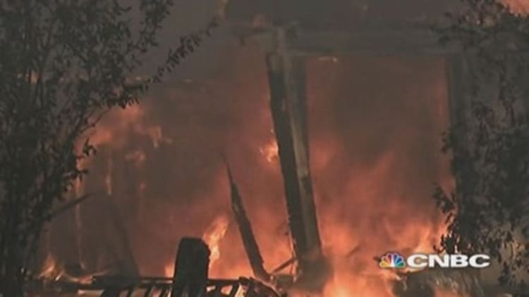 Wildfires destroy hundreds of homes