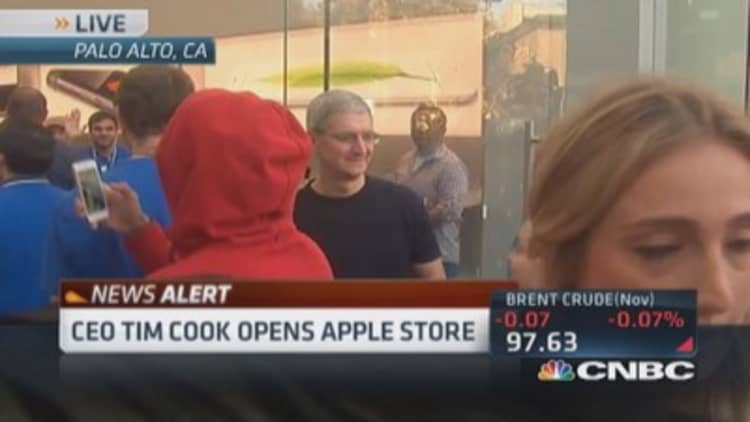 CEO Tim Cook tours Apple store