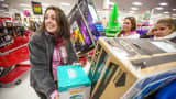 Shoppers load items into carts at a Target store in Braintree, Massachusetts.