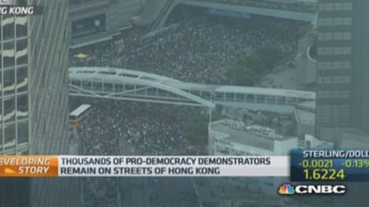 Protestors pour back onto Hong Kong's streets