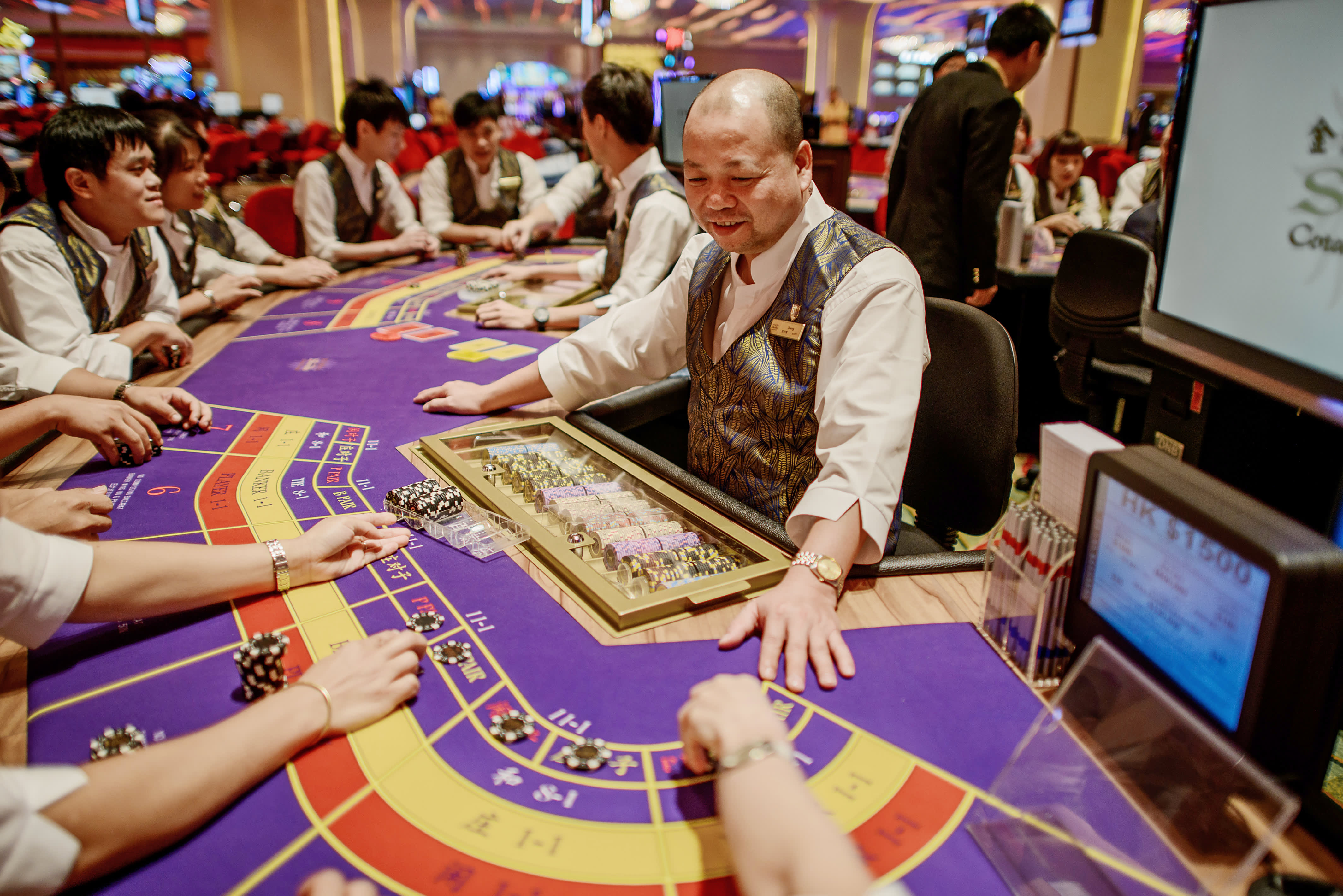 Macau's June gaming revenue expected to surge as much as 33 percent on easy comps