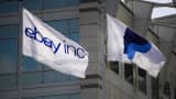 PayPal and eBay flags fly in front of the company's headquarters in San Jose, Calif.