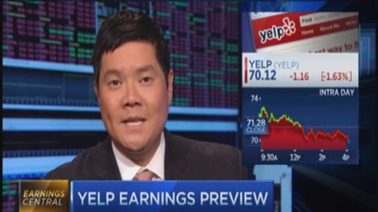 Earnings preview: AT&T & Yelp