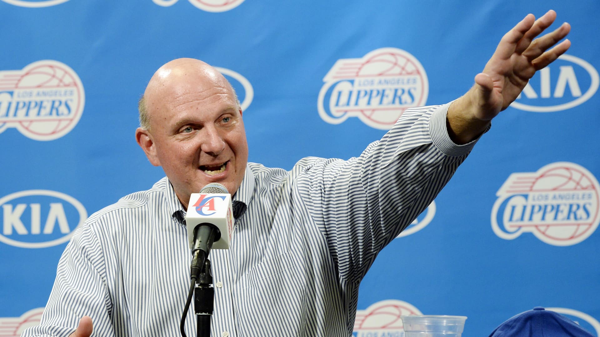 Steve Ballmer, former chief executive officer of Microsoft Corp., gestures as he speaks during a news conference after he was introduced as the new owner of the Los Angeles Clippers in Los Angeles, California.