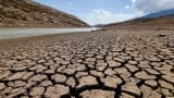 The dried cracked bed of the Qaraoun artificial lake is seen in West Bekaa, Lebanon, Sept. 19, 2014.