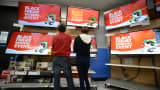 Shoppers consider televisions at a Walmart in Los Angeles on Black Friday.