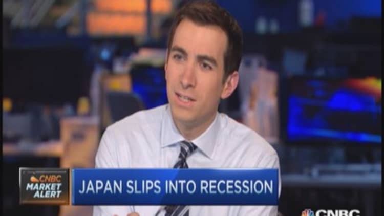 Japan slips into recession, Nikkei drops 3%