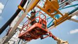 A worker on a oil and gas drilling rig.