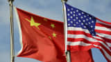 The flags of the U.S. and China.