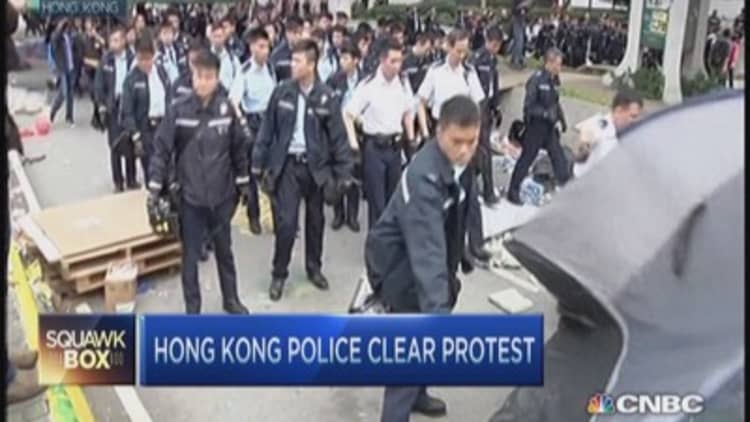 Hong Kong police clear out protesters