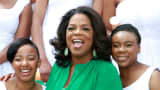 Oprah Winfrey poses with graduates at the inaugural graduation of the Oprah Winfrey Leadership Academy for Girls on January 14, 2012 in Henley on Klip, South Africa.